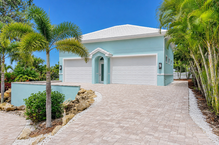 Detached Garage Addition: Multi Car Garage with Upstairs Lounge 