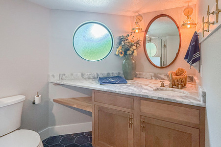 Half Bath to Full Bathroom Remodel | Shower Addition & Stained Glass Window Upgrade