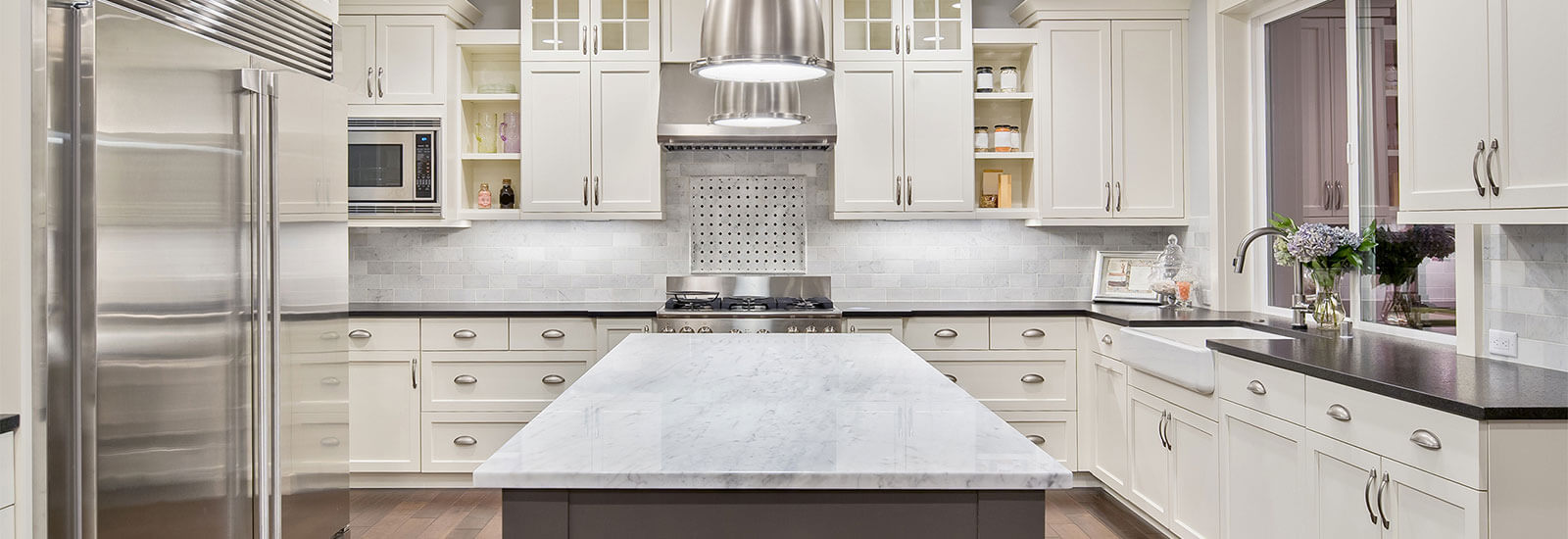 Contemporary Residential Kitchen with White Cabinets and Center Island